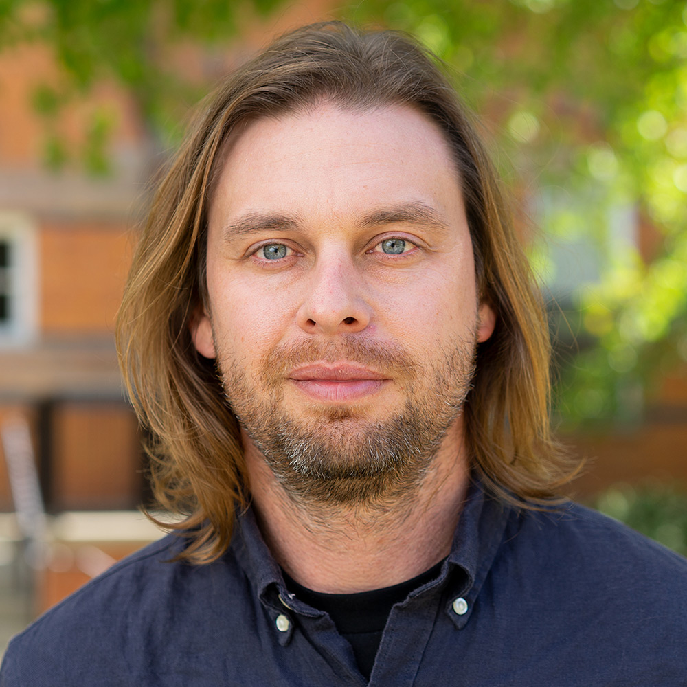 Image of Ben Van Dyke outside with trees behind hihm.