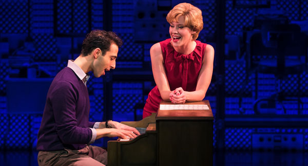 woman leaning on a piano while a man is playing the piano