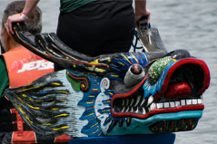 the front of the boat that is a dragon head