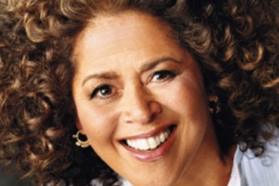 zoomed in photo of woman smiling into the camera