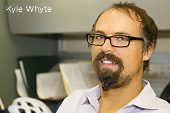 man wearing glasses and a white shirt